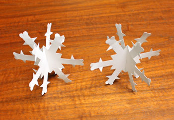 3D Paper Snowflake two on a table