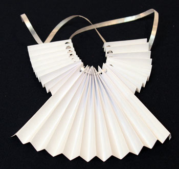 Accordian Folded Paper Angel Ornament Step 9 thread ribbon through holes