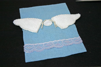 Easy Angel Crafts Angel Gift Bag finish sewing lace to bottom