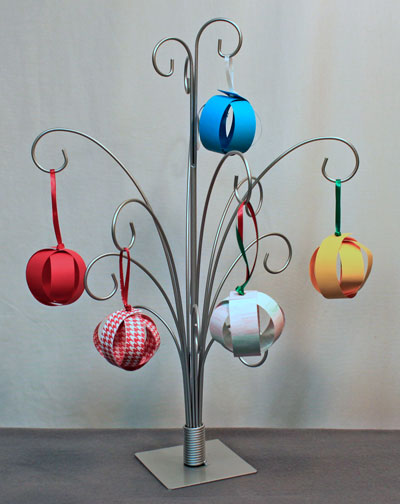 Easy Christmas Ornaments paper sphere several finished hanging on an ornament tree