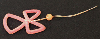 Easy Angel Crafts Wire Cross Angel Step 12 thread yarn through bead
