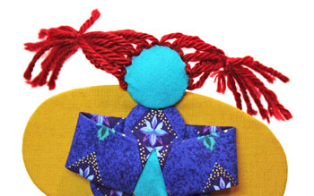 Easy Angel Crafts Yo Yo Angel Ornament step 24 tie yarn hair