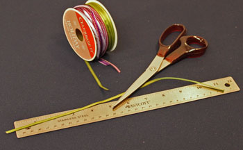 Easy Christmas Crafts Paper Circles Ornament step 1 cut ribbon