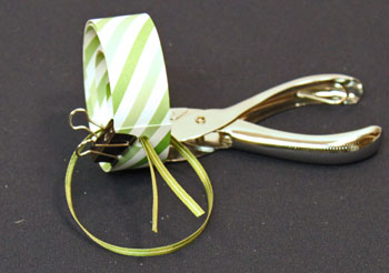 Easy Christmas Crafts Paper Circles Ornament step 7 thread ribbon through holes