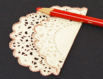 Easy Christmas Crafts Paper Doily Folded Christmas Tree Ornament step 2 fold the doily by two-thirds