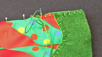 Easy Christmas Crafts Woven Ribbon Christmas Tree Door Hanger step 16 begin sewing edges together