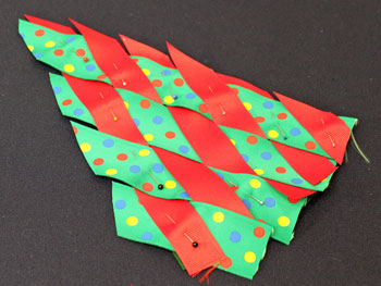 Easy Christmas Crafts Woven Ribbon Christmas Tree Door Hanger step 8 finish weaving ribbons