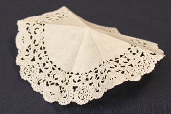 Easy Christmas Crafts Paper Doily Flower Ornament step 3 fold doily in eights