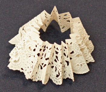 Easy Christmas Crafts Paper Doily Flower Ornament step 7 crease folds
