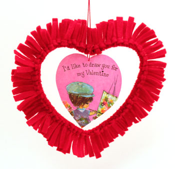Easy felt crafts fringed felt heart hanging with valentine in middle