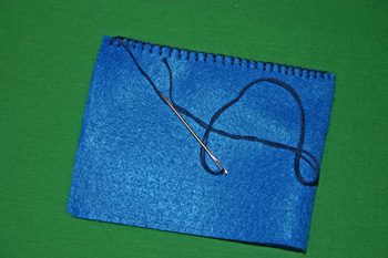 Easy felt crafts keepsake gift bag stitch to top of bag