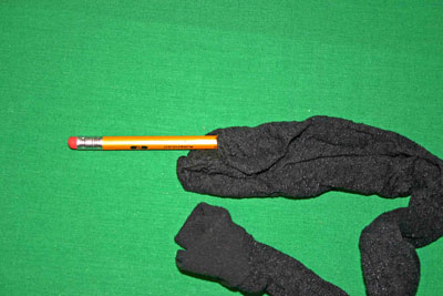 Frugal-Fun-Crafts-Mending-Socks-with-light-bulbs-trouser-sock-hole1