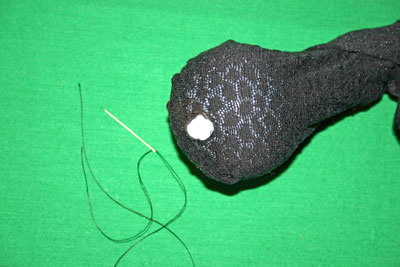 Frugal-Fun-Crafts-Mending-Socks-with-light-bulbs-trouser-sock-hole-with-bulb-needle