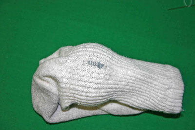Frugal-Fun-Crafts-Mending-Socks-with-light-bulbs-white-sock-back-hole1