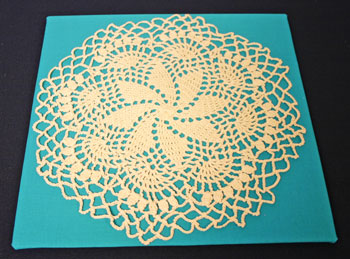 Frugal fun crafts framed doily position on background