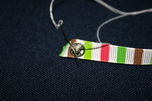 Frugal fun crafts mobius bracelet sewing second part of snap fastener