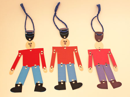 Easy Christmas Crafts Paper Nutcracker Soldier showing three different versions finished