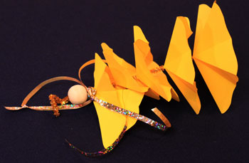 Easy Angel Crafts Paper-Star-Angel-Ornament-Pattern Step 15 tie ribbon around neck