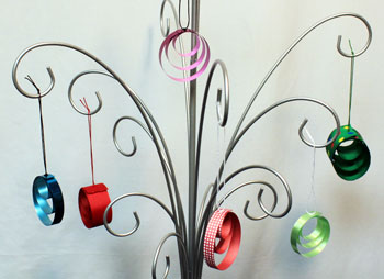 Easy Christmas crafts Ribbon Circles Ornament several finished hanging on an ornament tree