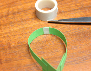 Singing Angel step 14 apply tape to center of arms