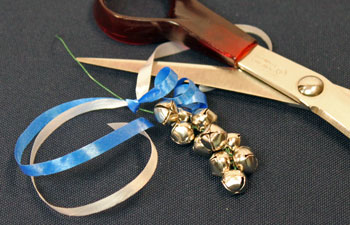 Easy Christmas Crafts Bell Ornament step 10 curl ribbon