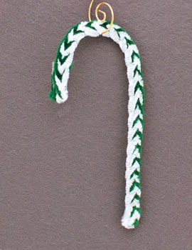 braided candy cane ornament hanging on display
