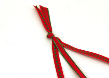 Braided ribbon wreath ornament step 1 tie knot in ribbons