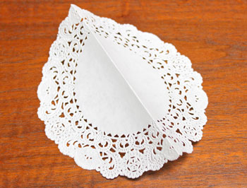 Cardstock and Doily Angel step 2 fold doily in half