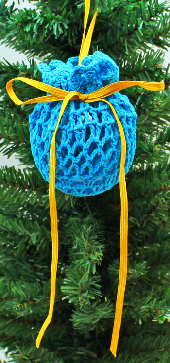 Crocheted Doily Wrapped Ornament blue finished on tree
