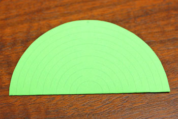 Cut Paper Circle Ornament step 2 fold in half