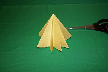 Easy Christmas crafts - folded paper Christmas tree tree stands on flat part of bottom