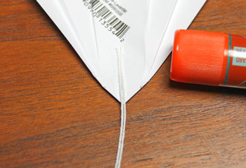 Folded Square Paper Angel step 7 glue yarn loop