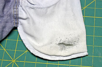 jeans pocket with large hole