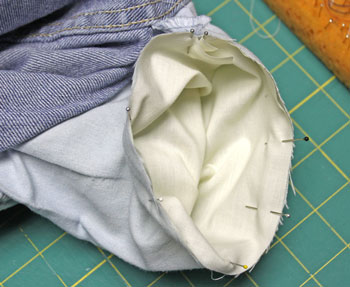 How to repair jeans pocket step 3 pin fabric to inside of the pocket