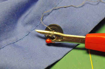 How to sew on a button step 1 remove the loose button