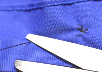 How to sew on a button step 15 cut thread