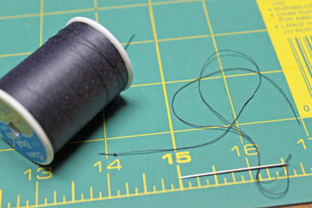 How to sew on a button step 4 thread needle