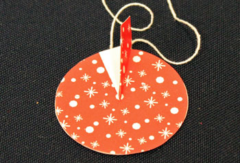 Easy Christmas Crafts Paper Pinwheel Wreath Ornament step 12 place fold on line